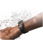 Xiaomi Smart Band 11 Active in Black worn on the wrist with water splashes